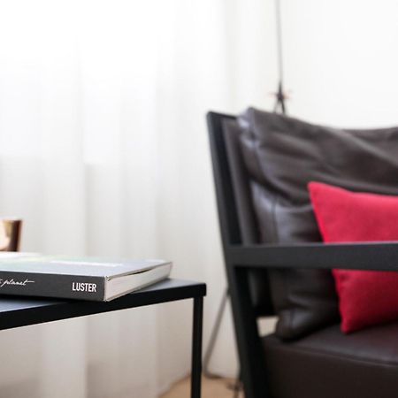 Maison Nationale City Flats & Suites Antwerpen Rom bilde The interior of the hotel