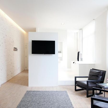 Maison Nationale City Flats & Suites Antwerpen Rom bilde A room at the hotel