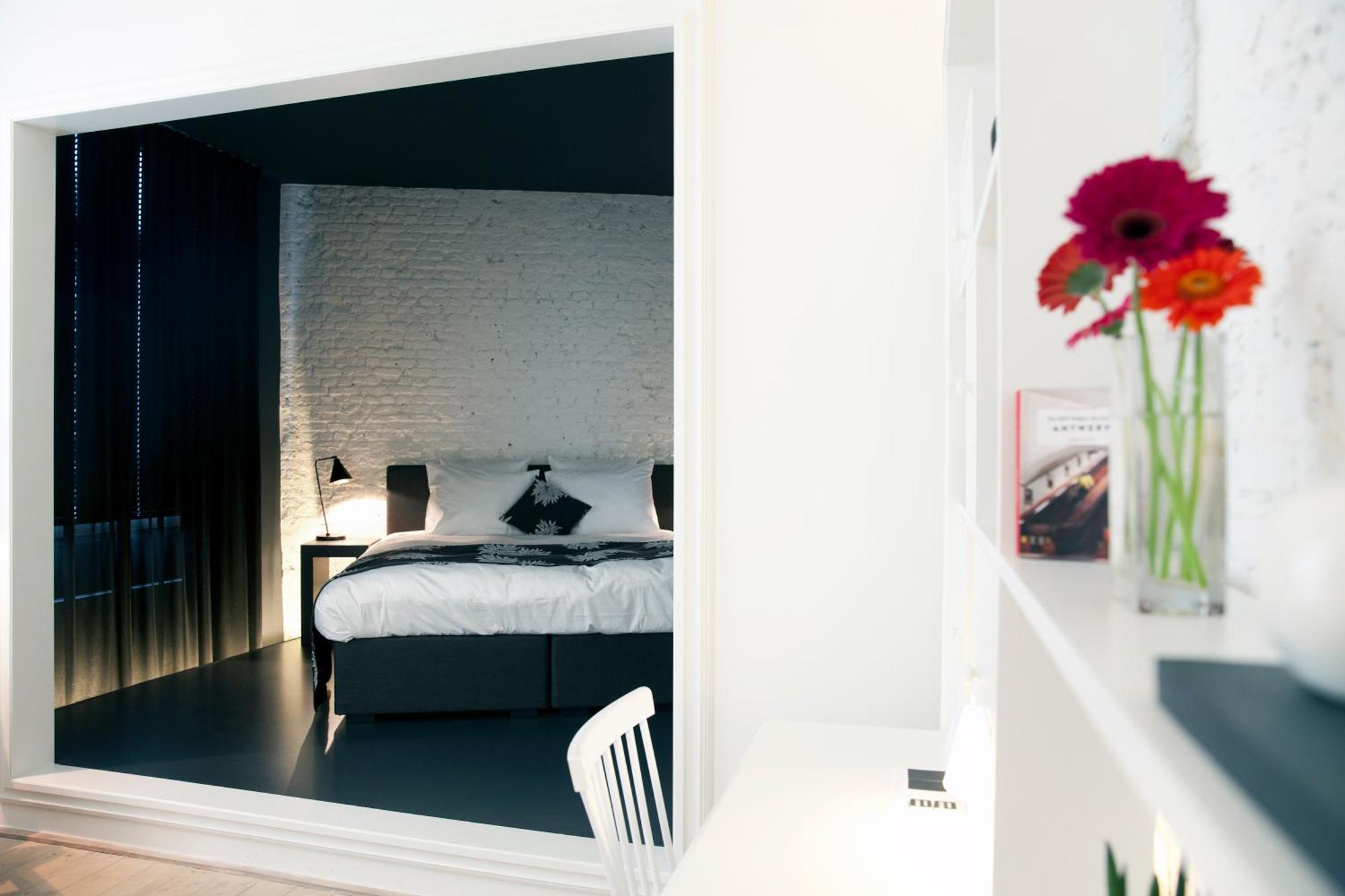Maison Nationale City Flats & Suites Antwerpen Eksteriør bilde A room at the hotel