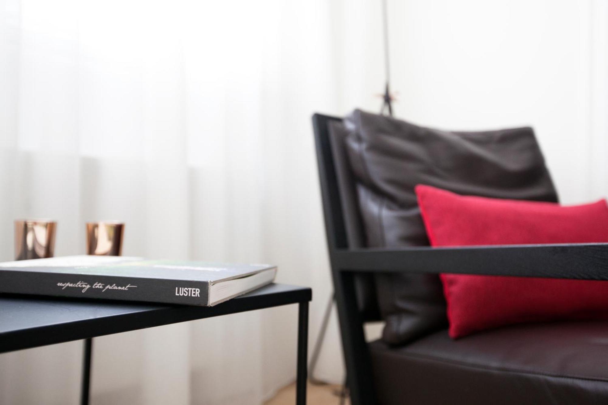 Maison Nationale City Flats & Suites Antwerpen Rom bilde The interior of the hotel