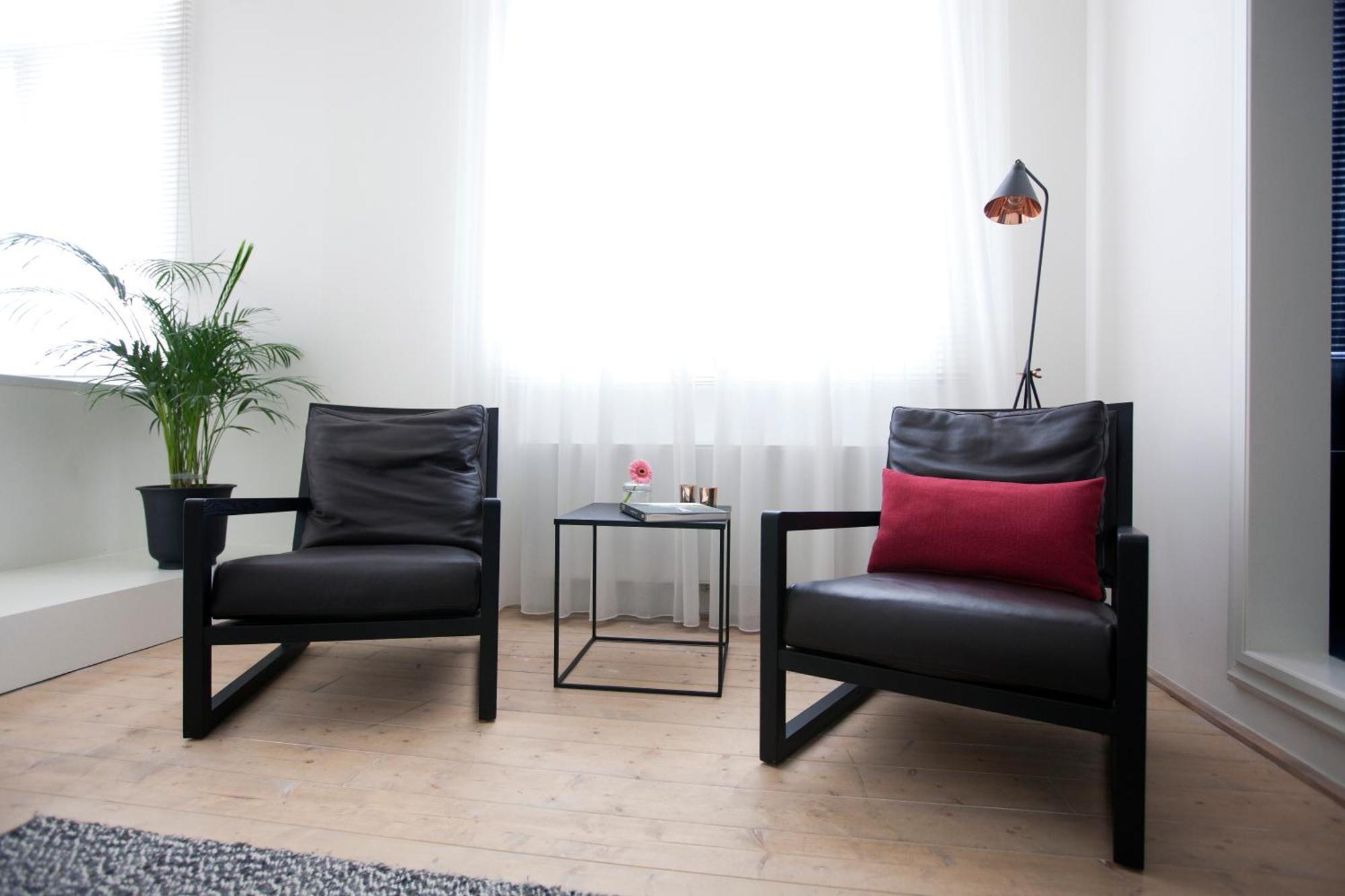 Maison Nationale City Flats & Suites Antwerpen Rom bilde Interior of a room at the hotel