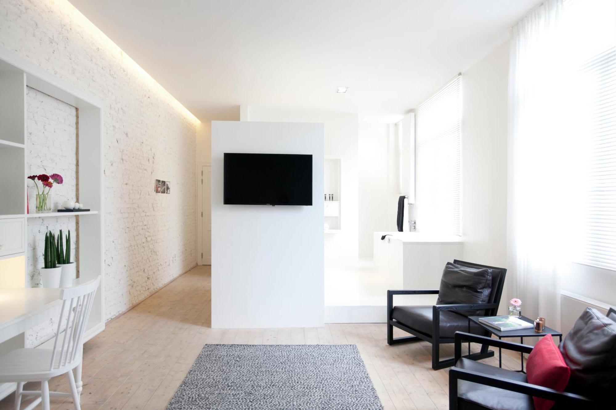 Maison Nationale City Flats & Suites Antwerpen Rom bilde A room at the hotel