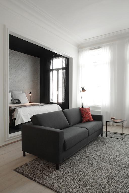 Maison Nationale City Flats & Suites Antwerpen Rom bilde A room at the hotel
